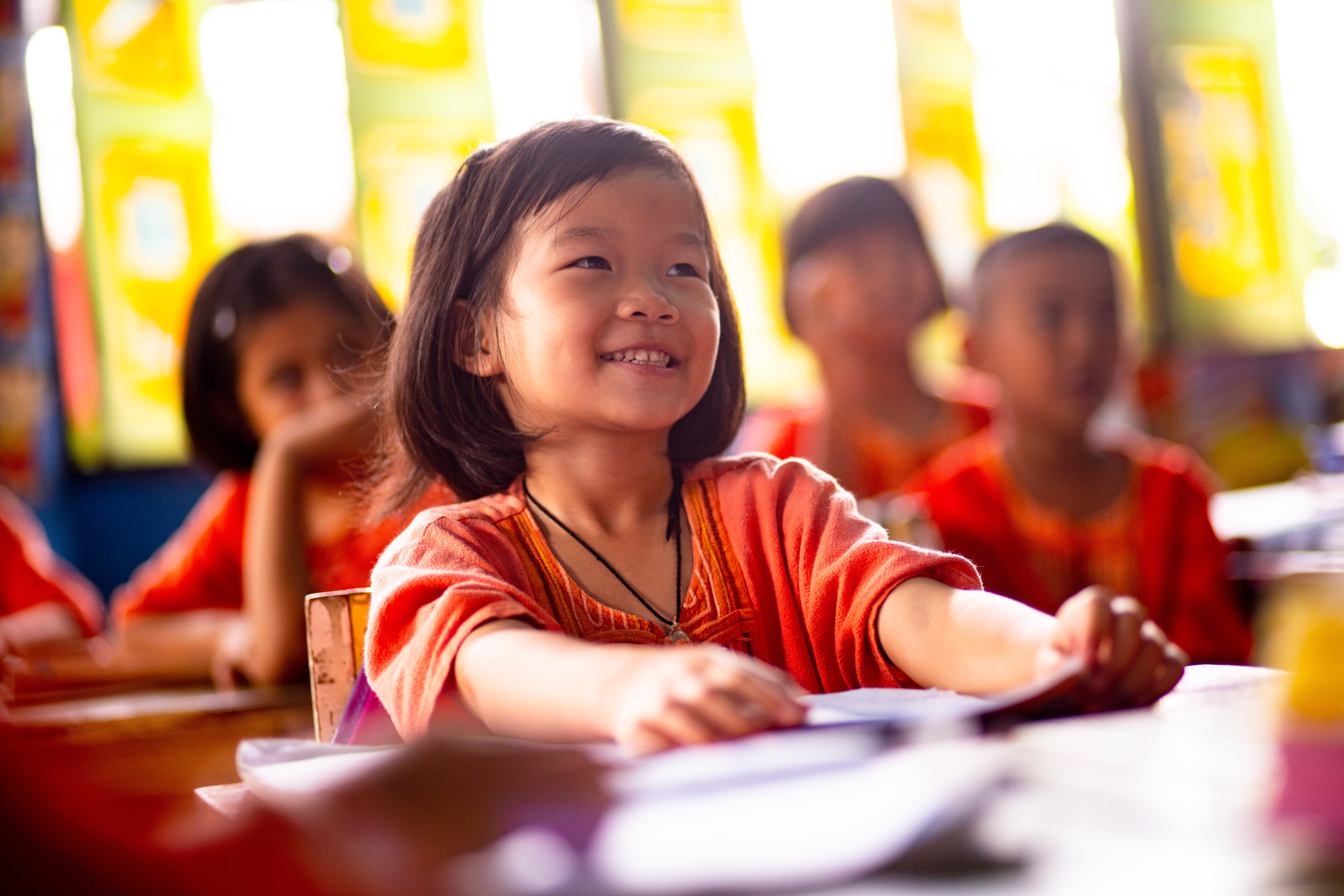 Ein Mädchen aus Thailand lacht. (Quelle Jakob Studnar)