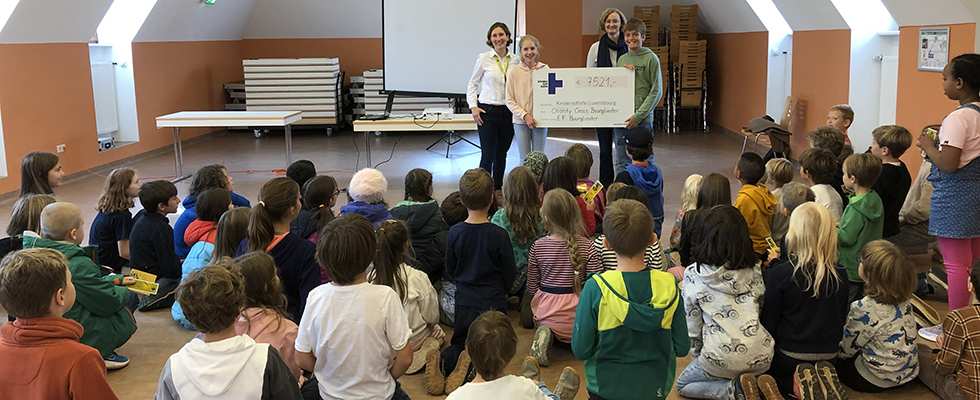 Scheckübergabe nach dem Charity Run in Bourglinster (Quelle: Kindernothilfe)