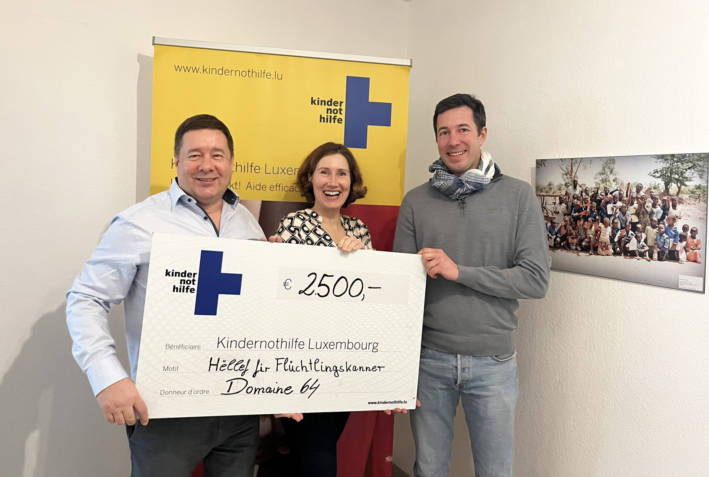 Schecküberreichung Domaine 64  an KNH Luxembourg (Foto: Kindernothilfe Luxembourg)